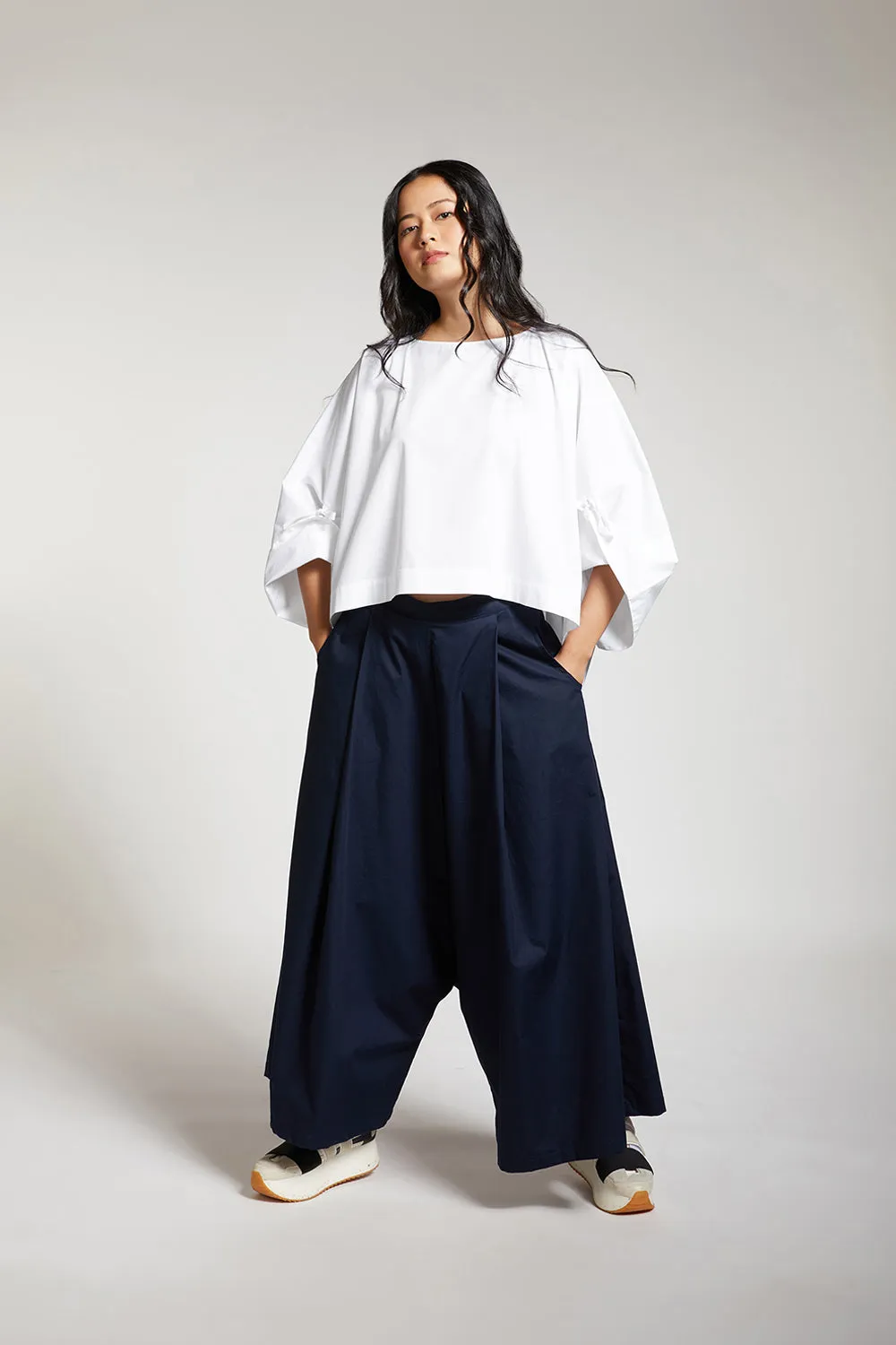 LOW CROTCH FLARE PANTS WITH PLEATS